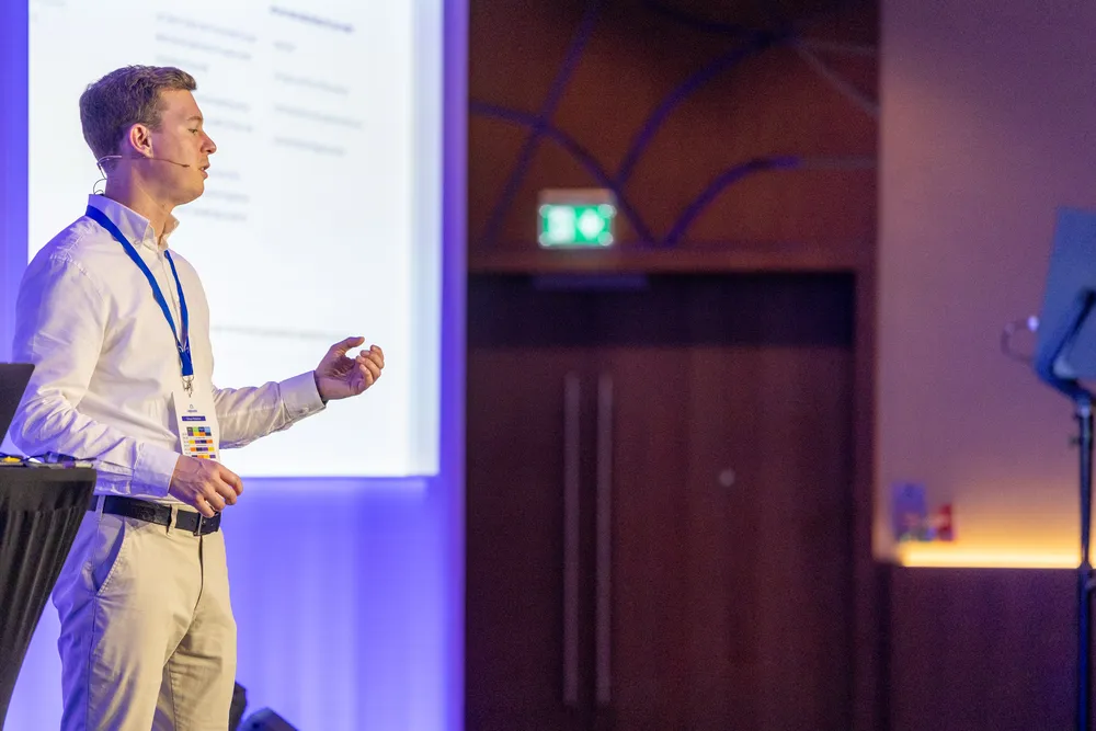 Michael James presenting an AI workshop session to a business audience